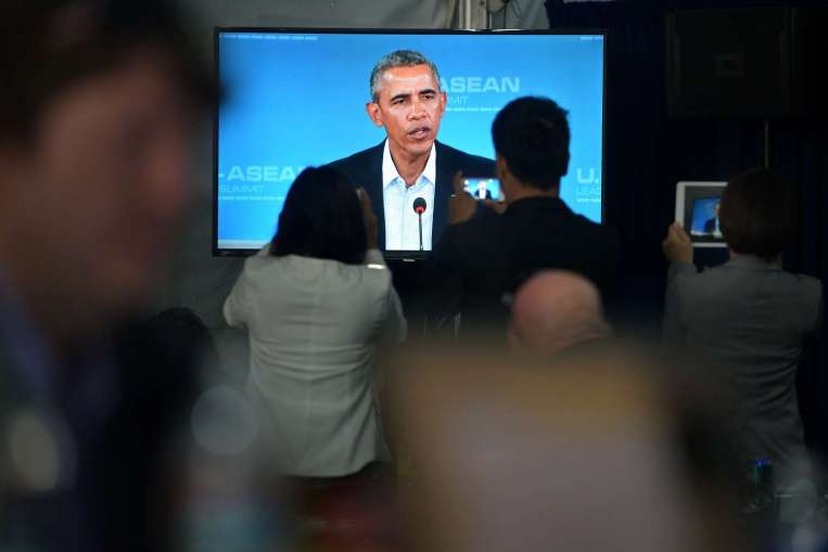 Các phóng viên đang ghi hình bài phát biểu của Tổng thống Barack Obama tại Trung tâm Truyền thông Quốc Gia trong Cuộc họp các nhà lãnh đạo Mỹ- Asean diễn ra vào ngày 15/02/2016. Ảnh: Kua Chee Siong.