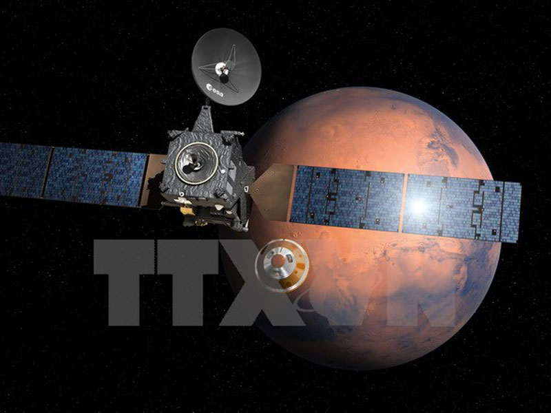 Hình ảnh mô phỏng module đổ bộ Schiaparelli tách khỏi Trạm liên hành tinh Nga-châu Âu ExoMars và tiến tới Sao Hỏa. (Nguồn: AFP/TTXVN).