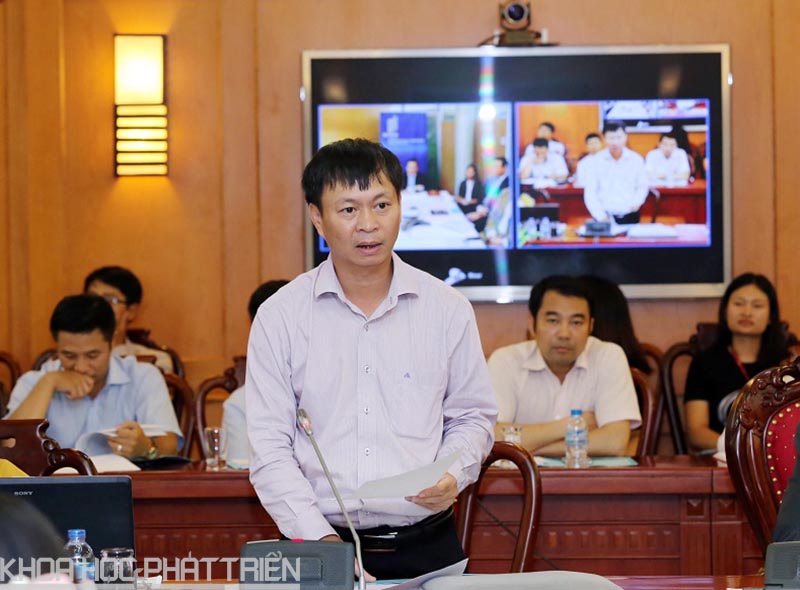 TS Hoàng Minh - báo cáo tại hội thảo