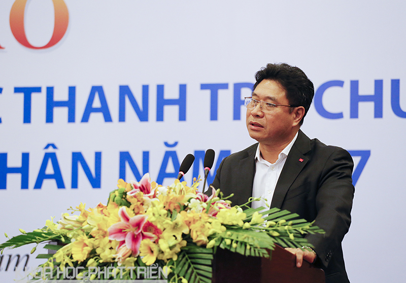 Ông Trương Hồng Dương báo cáo tại hội thảo.