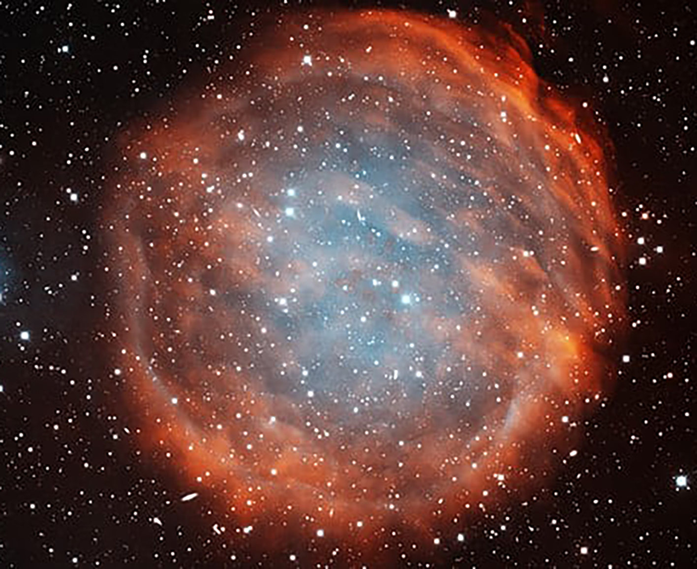 PuWe 1, một tinh vân hành tinh được tạo thành khi một ngôi sao khổng lồ đỏ bị thổi bay lớp vỏ ngoài vào cuối vòng đời. Nguồn: TheGuardian.com