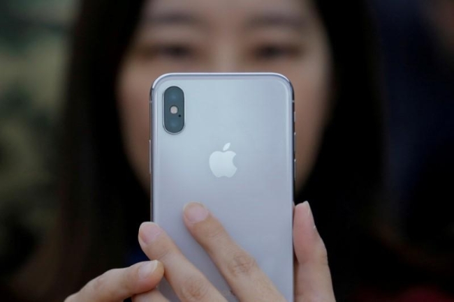 iPhone X giúp Apple tăng doanh thu mạnh, dù số lượng sản phẩm bán ra không tăng nhiều - Ảnh: Reuters