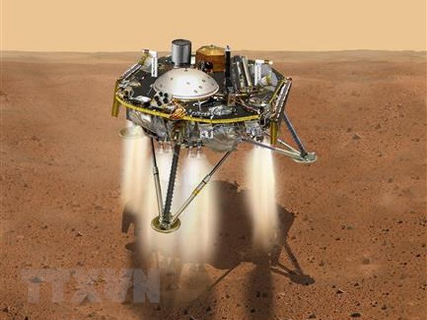 Hình ảnh mô phỏng Tàu thăm dò sao Hỏa InSight đổ bộ xuống bề mặt sao Hỏa. (Ảnh: AFP/TTXVN)