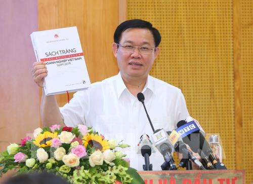 Phó Thủ tướng Vương Đình Huệ công bố Sách trắng doanh nghiệp Việt Nam năm 2019. Ảnh: Doãn Tấn/TTXVN