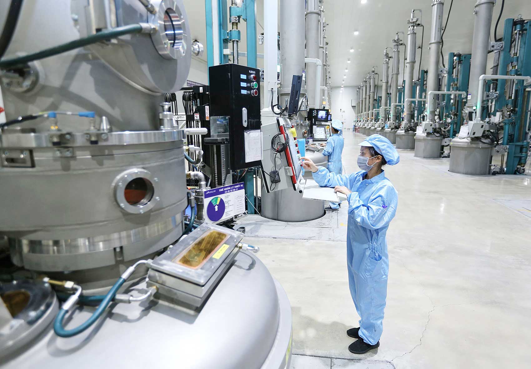 Hỗ trợ doanh nghiệp đẩy mạnh sử dụng công cụ sở hữu trí tuệ trong hoạt động sản xuất, kinh doanh. Ảnh: TTXVN