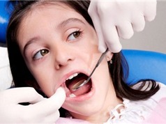 Hàm răng nham nhở của trẻ khi bị nước ngọt phá hủy
